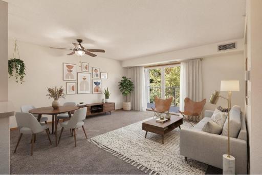 Living/dining room virtually staged. Patio doors lead to spacious balcony overlooking wooded area.
