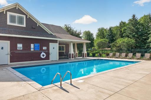 When the summer heat hits, this refreshing heated in-ground pool and sun-soaked lounge chairs are waiting for you; just steps from your front door.