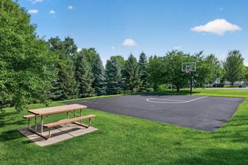 Summer days can be spent shooting hoops at the community basketball court!