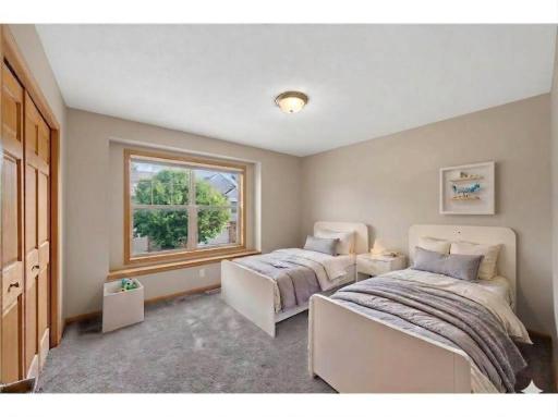 VIRTUAL STAGING! The versatile second bedroom offers flexibility to fit your lifestyle. Spacious so perfect for a 2nd bedroom, or as a guest room, home office, hobby space, or additional flex room.