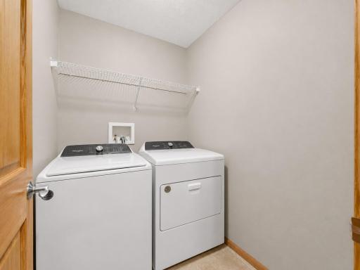 No more carrying laundry up and down stairs; enjoy the convenience of an upper-level laundry room perfectly placed near the bedrooms.