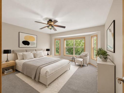 VIRTUAL STAGING! Spacious primary suite featuring a charming bay window, large walk-in closet, and private ensuite bathroom.