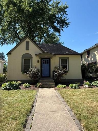Charming and quaint! Low-maintenance front landscaping, new storm door and recently painted trim on home and garage.
