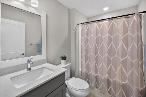 Full lower-level bath adds convenience for guests and extended stays