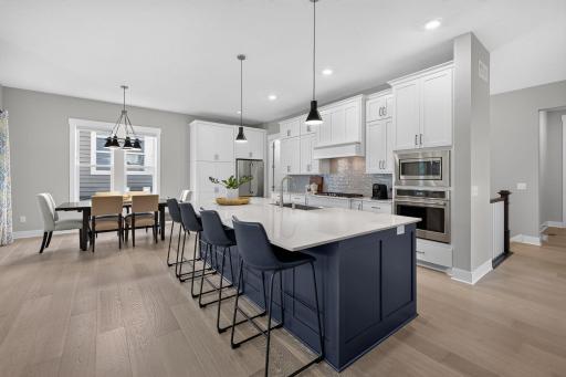 The open kitchen and dining area is designed for effortless everyday living and entertaining
