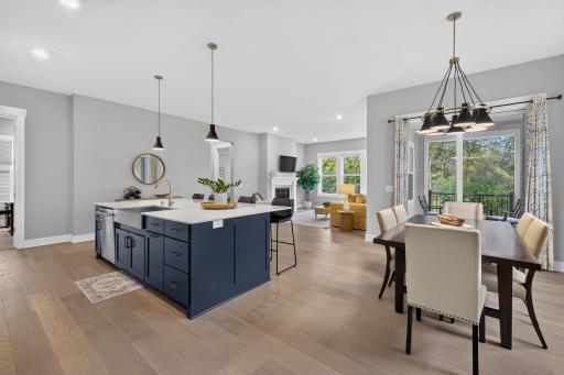 The open-concept design creates an easy flow between kitchen, dining and living spaces