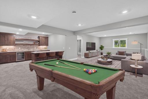 Virtually staged to showcase the lower levelâs potential for entertaining, relaxing and recreation