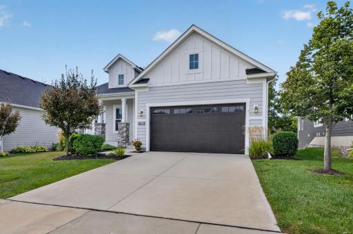 This Excelsior home offers welcoming curb appeal in the desirable Minnetonka Country Club neighborhood