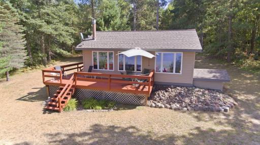 Wall of windows to enjoy the view of Pine Lake.