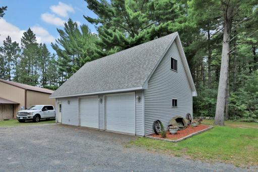 Detached 2 plus car garage with full recreation room above