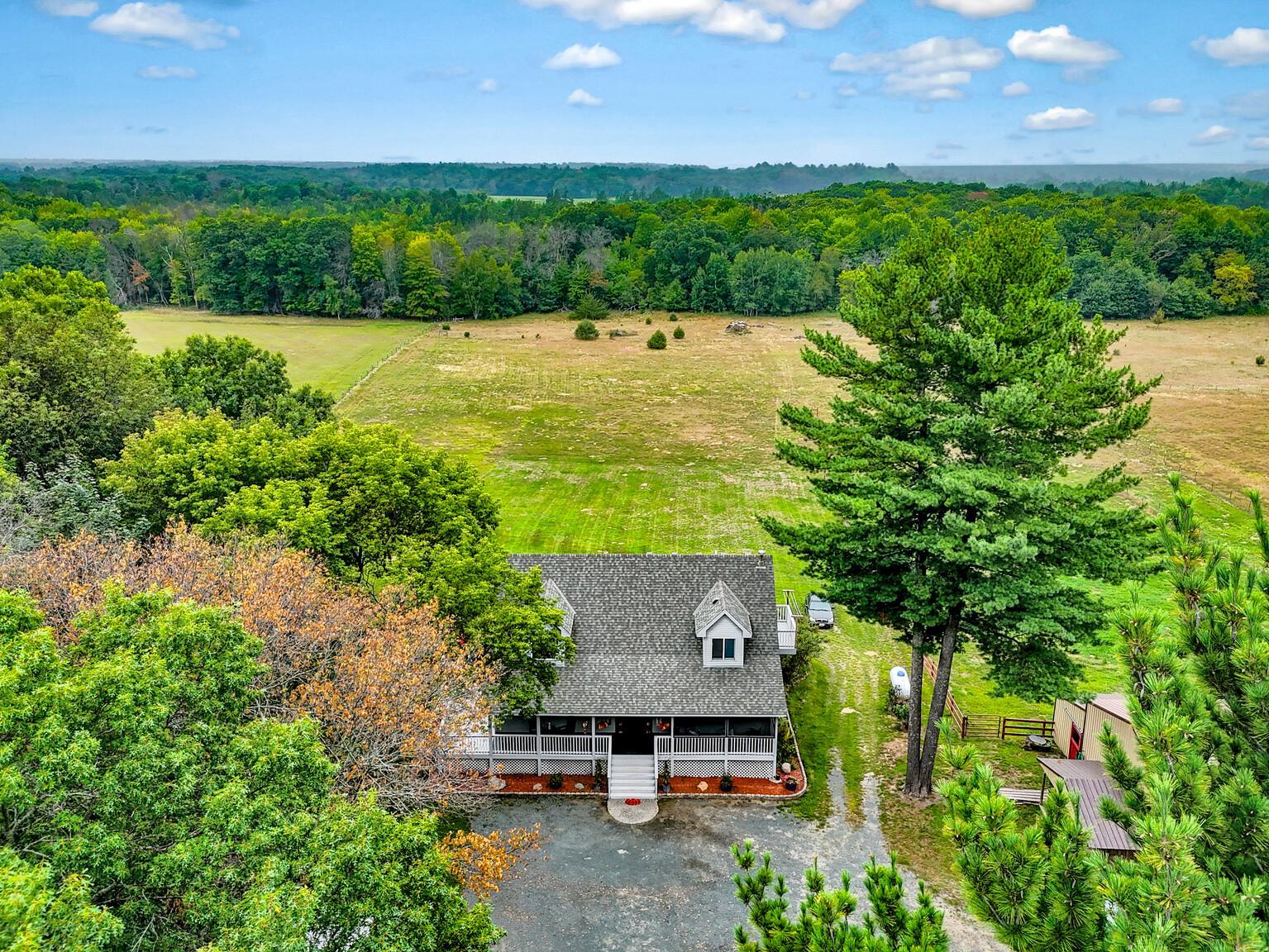 Welcome home to 7 acres of rustic charm, backing right up to Carlos Avery Wildlife Management Area.03_3_mls.jpg