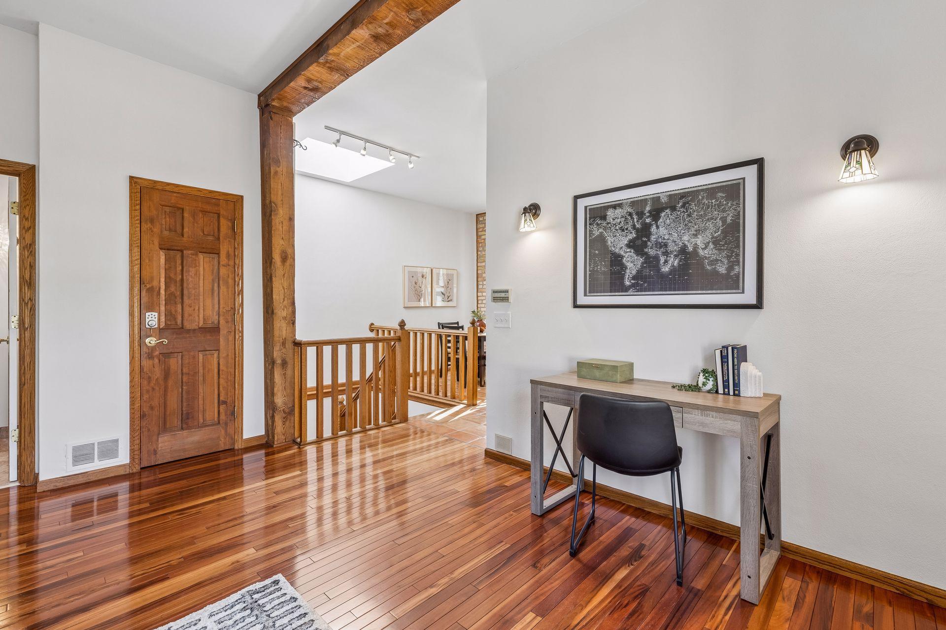 The real wood doors, rails, columns and beams in this condo give it so much character.
