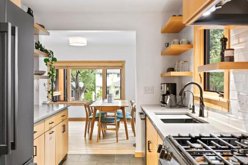 Every inch of this kitchen is new with gorgeous white oak cabinetry, chef-worthy appliances, abundant counter space and storage