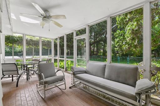 Screen Porch overlooking private backyard and Tennis Court