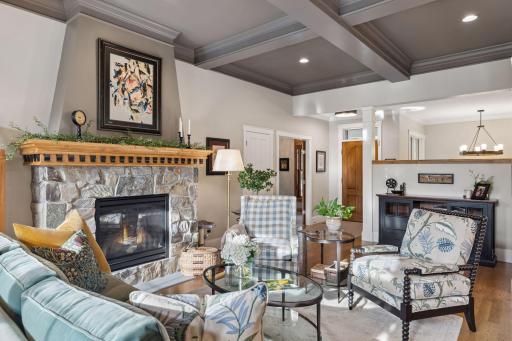 The living room combines traditional craftsmanship with comfortable everyday living.