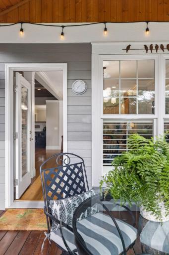 The screen porch sits just beyond the dining area for easy indoor-outdoor living.
