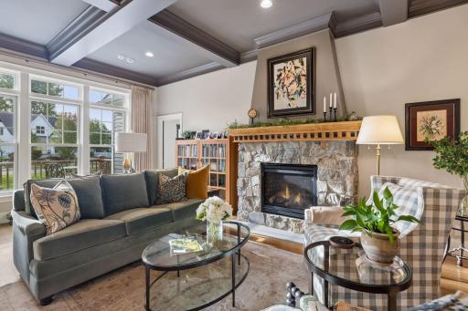 The living roomâs coffered ceiling and wall of windows make an immediate impression.