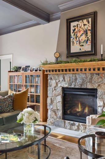 A closer look at the real stone fireplace and custom architectural details.