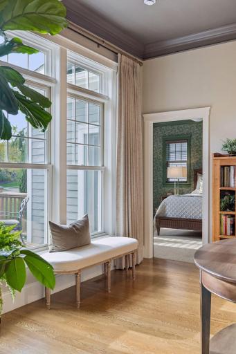 Windows throughout the main level keep the outdoor setting in view.