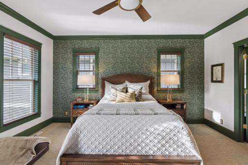Main-floor primary suite with rich architectural detail and a calm, comfortable feel.