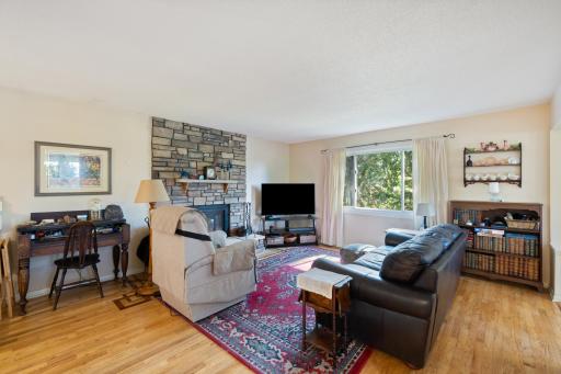 living room Offering Hardwood flooring and a beautiful inlaid design