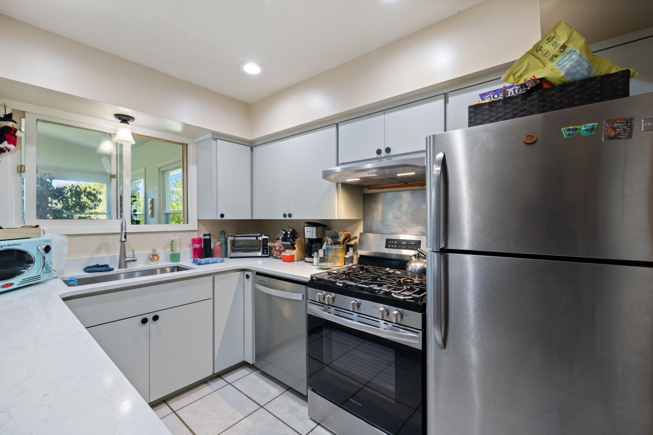 kitchen Newer Appliances, Updated cabinet doors, Tile flooring
