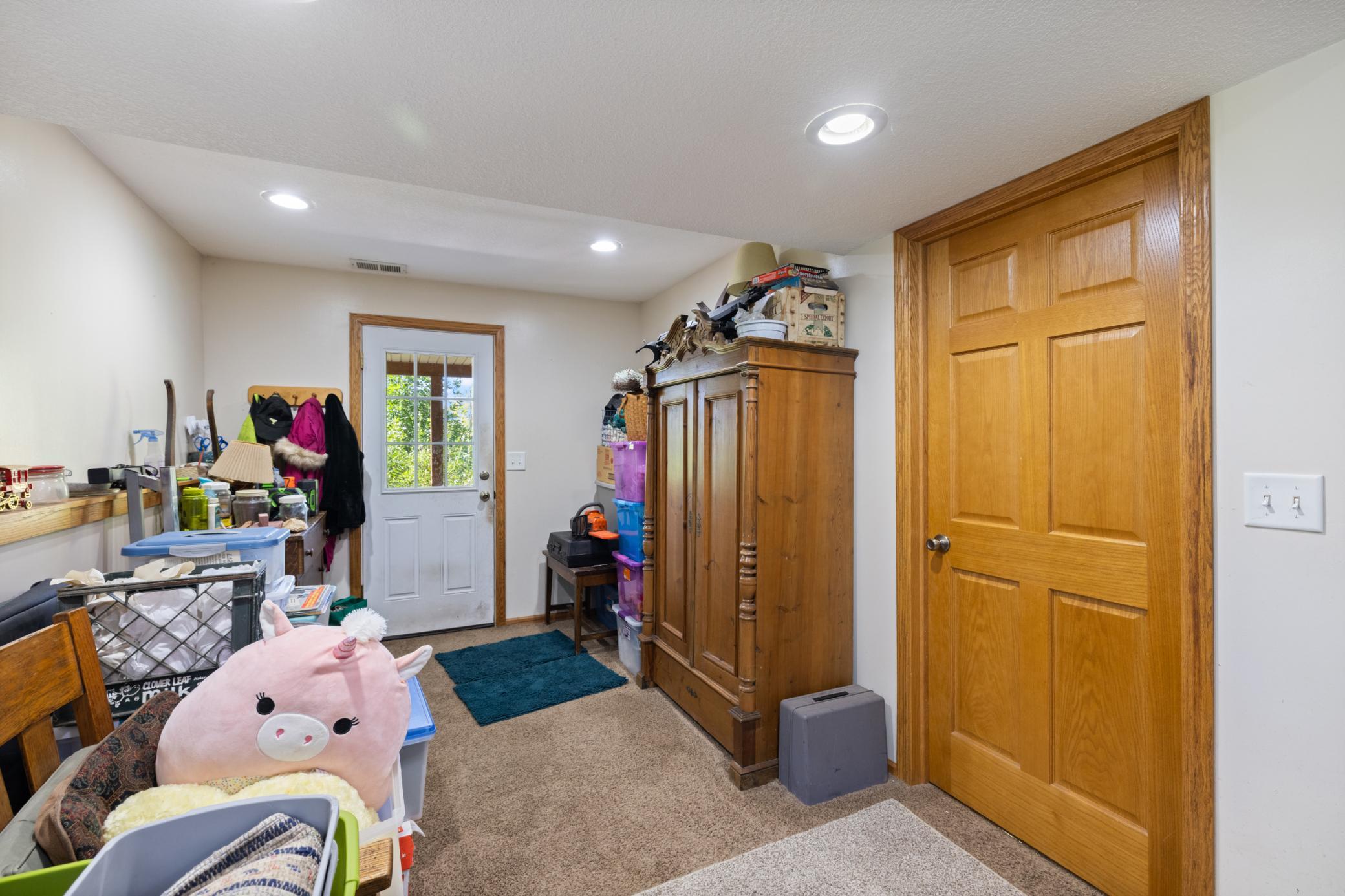 family room offers entrance to back yard