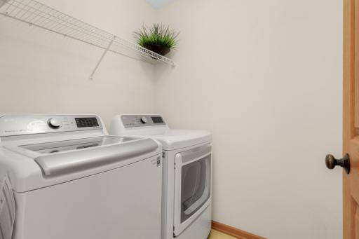 Convenient upper-level laundry ROOM, right next to the bedrooms!