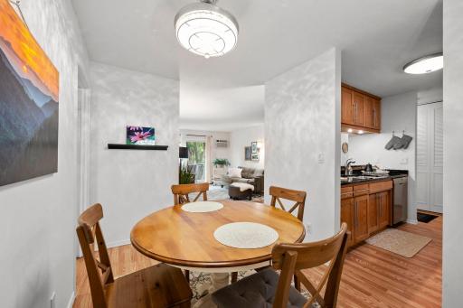 Dedicated dining area with updated lighting.