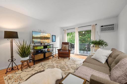 Newer flooring throughout. AC units in LR and each BR to ensure maximum comfort. Tasteful and cohesive updates throughout this unit!