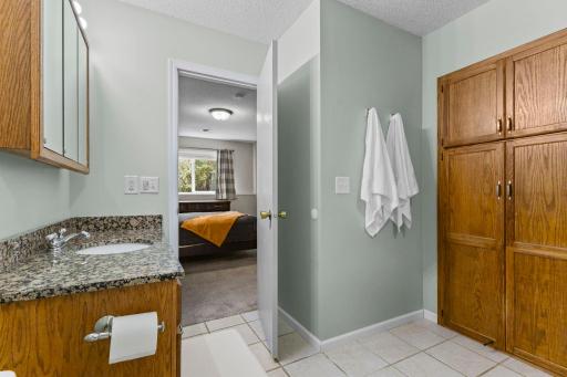 The lower level bathroom has a walk through to the bedroom.