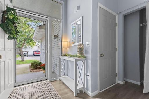 Step inside to the bright entryway with high ceilings.