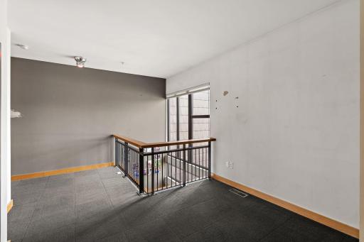 Open loft with floor to ceiling windows
