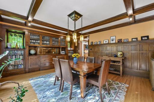 One of the standout features are the amazing original woodwork...built-ins, beamed ceilings, paneled walls and the French doors.