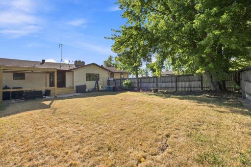 Rear Exterior / Fenced Backyard Space