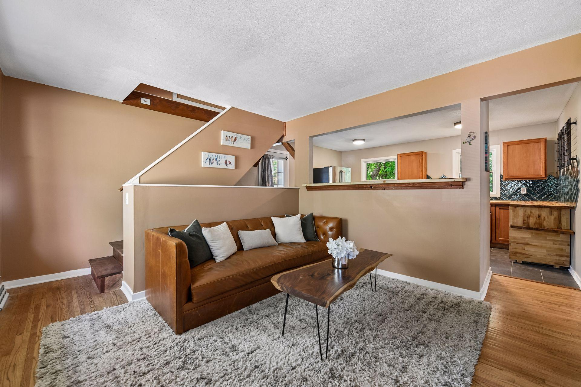 Main floor living room opens to kitchen