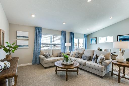 Main level living room area, enough space to accommodate many different furniture arrangements.