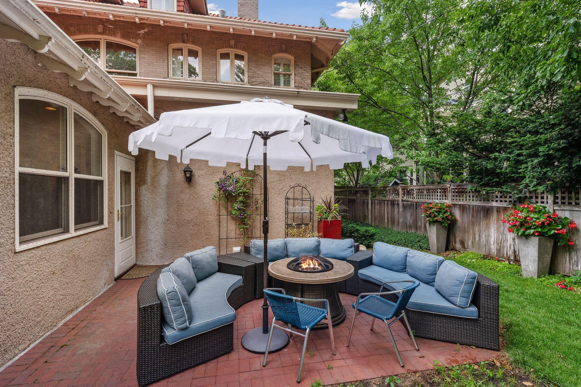 Beautiful paver patio that extends your entertaining space into a private outdoor oasis
