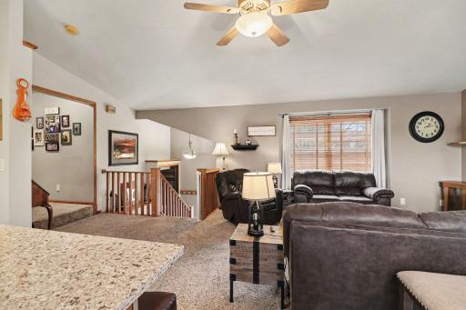 Vaulted upper level & open floor plan.