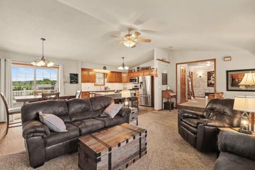 This upper level has a step up to the 3 bedrooms & bath. Large hall area great for displaying family photos.