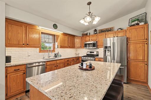 All stainless appliances & oak cabinetry.