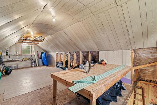 Loft area provides plenty of storage or work space!