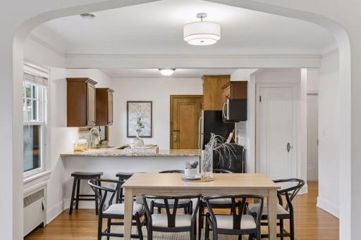 Upper unit - dining room open to kitchen.