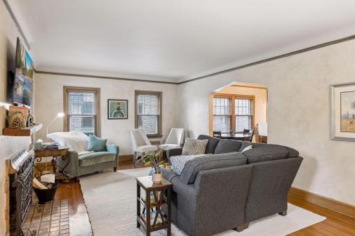 Main floor with hardwood floors and natural woodwork.