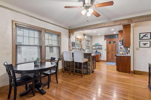 Main level dining area open to kitchen.