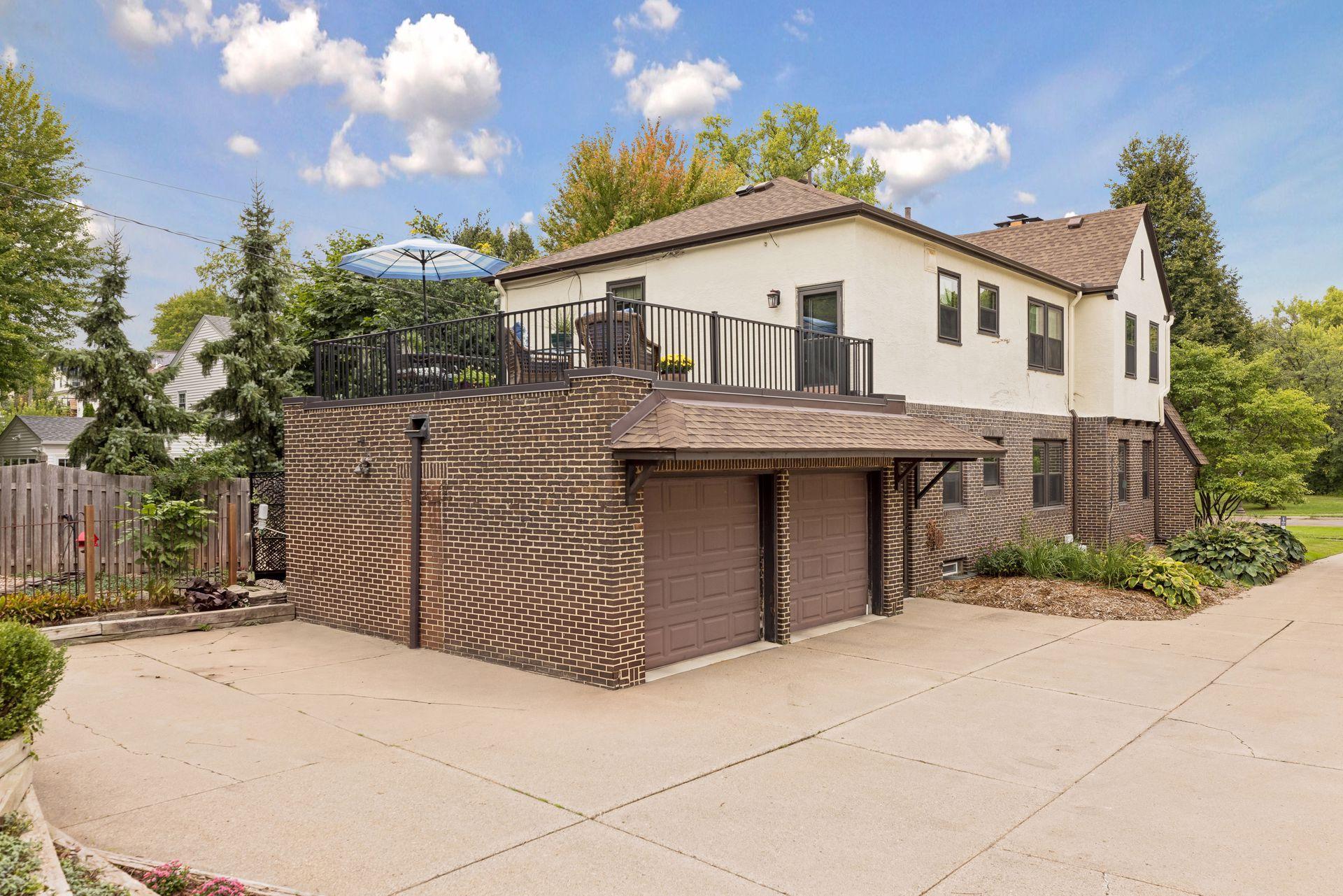 Handsome brick garage with water and electric.
