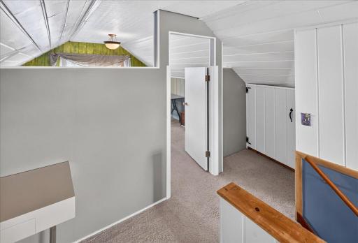 Door from loft area to 4th bedroom on the upper level.