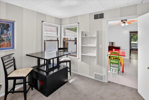 Another view of the family room. Note: The back table is actually the fresh air supply for the bomb shelter hidden below!