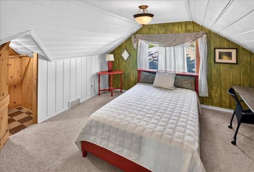 Bedroom #4 on the upper level. Don't miss all the amazing storage space tucked in throughout the upper level. Perfect for "stuff management"!