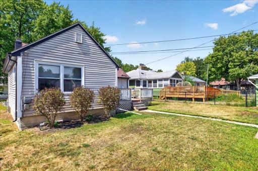 Partially fenced backyard is the perfect space for kids and pets!